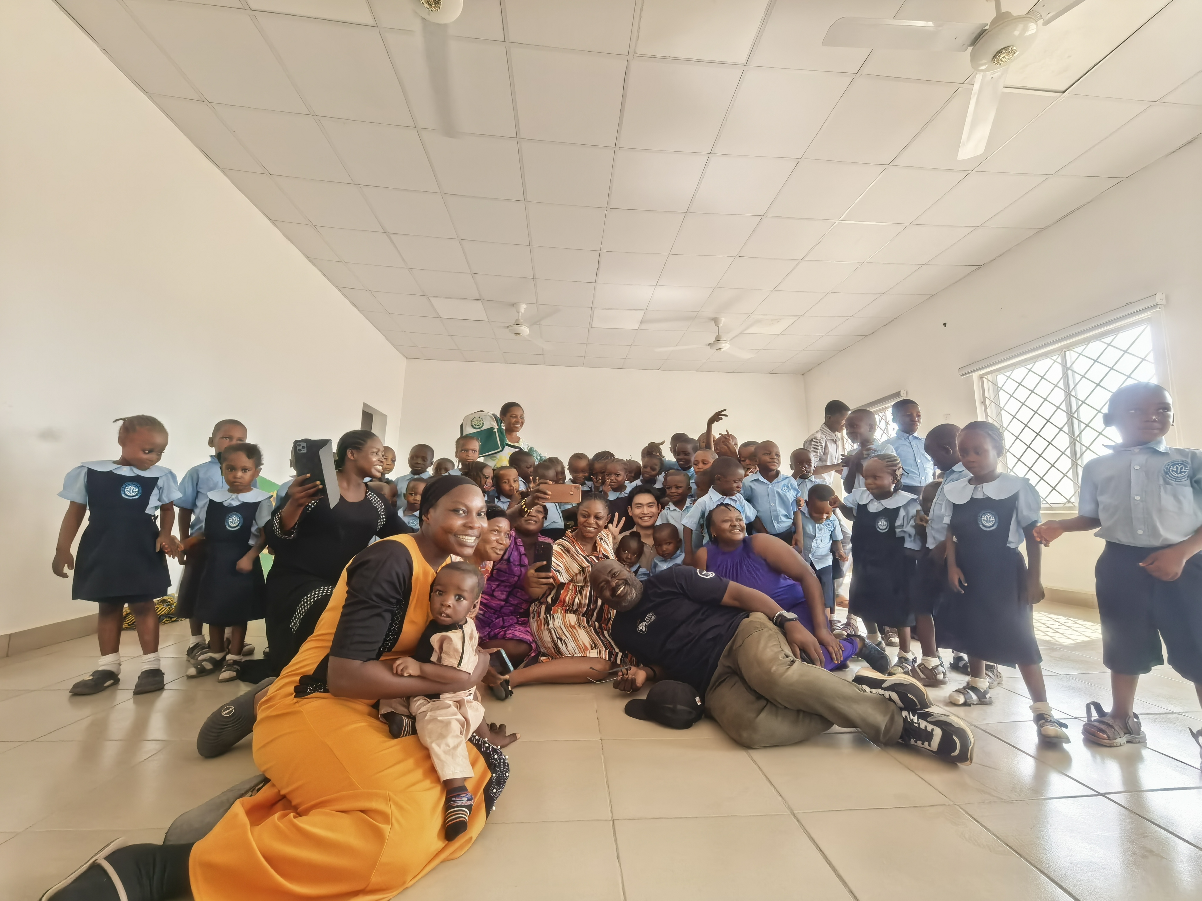 Community gathering with children and the JS team in Africa